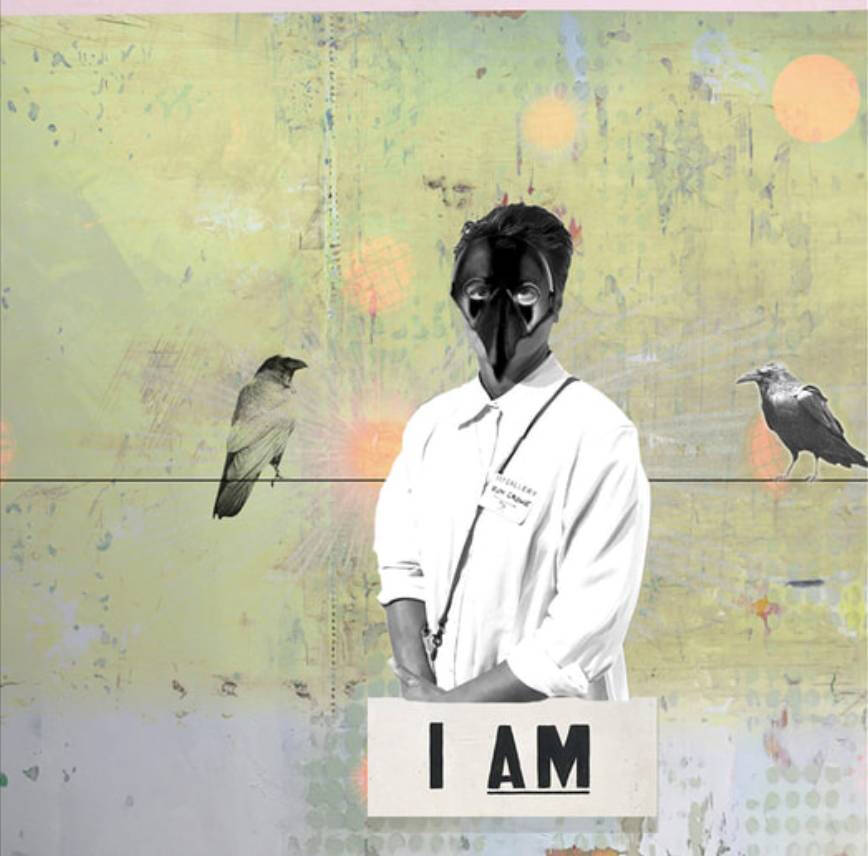 Person wearing a white shirt and a black mask with birds on either side of her and the words "I Am."